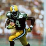 Sterling Sharpe running for a touchdown